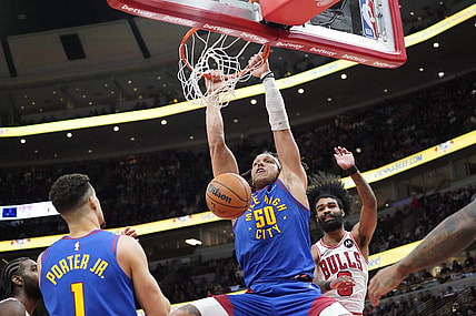 Dec 12, 2023; Chicago, Illinois, USA; Denver Nuggets forward Aaron Gordon (50) dunks the ball against the Chicago Bulls during the second half at United Center. Mandatory Credit: David Banks-USA TODAY Sports
