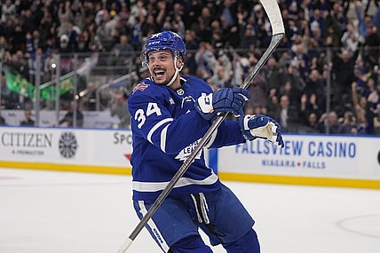 Dec 14, 2023; Toronto, Ontario, CAN; Toronto Maple Leafs forward Auston Matthews (34) reacts after scoring the tying goal to send the game to overtime against the Columbus Blue Jackets during the third period at Scotiabank Arena. Mandatory Credit: John E. Sokolowski-USA TODAY Sports