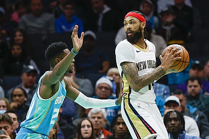 Dec 15, 2023; Charlotte, North Carolina, USA; New Orleans Pelicans forward Brandon Ingram (14) looks to pass over Charlotte Hornets forward Brandon Miller (24) during the first quarter at Spectrum Center. Mandatory Credit: Nell Redmond-USA TODAY Sports