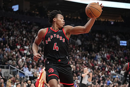 Dec 15, 2023; Toronto, Ontario, CAN; Toronto Raptors forward Scottie Barnes (4) grabs a rebound against the Atlanta Hawks during the first half at Scotiabank Arena. Mandatory Credit: John E. Sokolowski-USA TODAY Sports