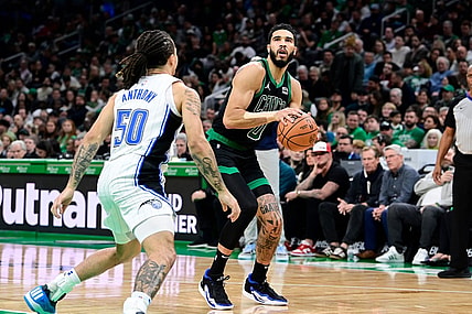 Dec 15, 2023; Boston, Massachusetts, USA; Boston Celtics forward Jayson Tatum (0) shoots the ball during the second half against the Orlando Magic at TD Garden. Mandatory Credit: Eric Canha-USA TODAY Sports
