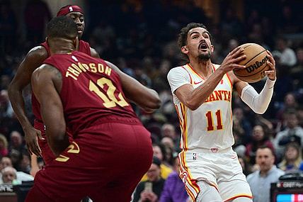 Dec 16, 2023; Cleveland, Ohio, USA; Atlanta Hawks guard Trae Young (11) drives to the basket against the Cleveland Cavaliers during the first half at Rocket Mortgage FieldHouse. Mandatory Credit: Ken Blaze-USA TODAY Sports