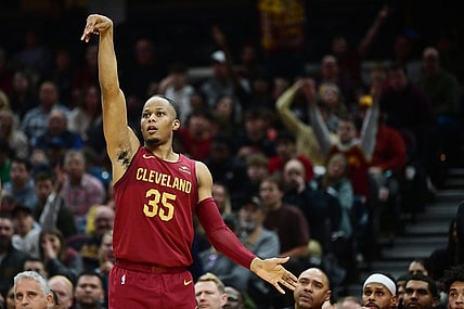 Dec 16, 2023; Cleveland, Ohio, USA; Cleveland Cavaliers forward Isaac Okoro (35) hits a three point basket during the second half against the Atlanta Hawks at Rocket Mortgage FieldHouse. Mandatory Credit: Ken Blaze-USA TODAY Sports