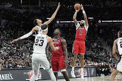 Dec 17, 2023; San Antonio, Texas, USA; New Orleans Pelicans Brandon Ingram (14) shoots over San Antonio Spurs forward Victor Wembanyama (1) during the first half at Frost Bank Center. Mandatory Credit: Scott Wachter-USA TODAY Sports