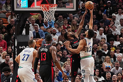 Dec 18, 2023; Miami, Florida, USA; Miami Heat forward Haywood Highsmith (24) blocks the shot of Minnesota Timberwolves center Karl-Anthony Towns (32) during the first half at Kaseya Center. Mandatory Credit: Jasen Vinlove-USA TODAY Sports