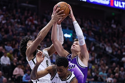 Dec 18, 2023; Salt Lake City, Utah, USA; Brooklyn Nets forward Trendon Watford (9) and Utah Jazz center Walker Kessler (24) battle for a rebound during the second quarter at Delta Center. Mandatory Credit: Rob Gray-USA TODAY Sports