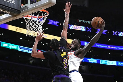Dec 18, 2023; Los Angeles, California, USA; New York Knicks forward Julius Randle (30) shoots the ball against Los Angeles Lakers forward Anthony Davis (3) at Crypto.com Arena. Mandatory Credit: Kirby Lee-USA TODAY Sports
