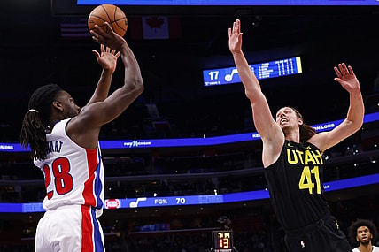 Dec 21, 2023; Detroit, Michigan, USA;  Detroit Pistons center Isaiah Stewart (28) shoots on Utah Jazz forward Kelly Olynyk (41) in the first half at Little Caesars Arena. Mandatory Credit: Rick Osentoski-USA TODAY Sports