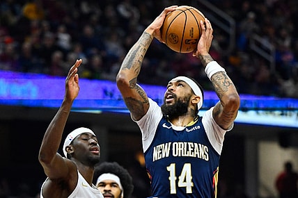 Dec 21, 2023; Cleveland, Ohio, USA; New Orleans Pelicans forward Brandon Ingram (14) drives against Cleveland Cavaliers guard Caris LeVert (3) in the second quarter at Rocket Mortgage FieldHouse. Mandatory Credit: David Richard-USA TODAY Sports