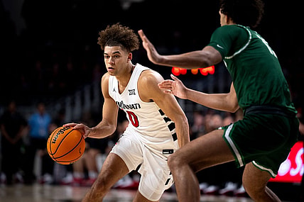 Cincinnati Bearcats guard Dan Skillings Jr. (0) drives to the basket in the first half of the basketball game between Cincinnati Bearcats and Stetson Hatters at Fifth Third Arena in Cincinnati on Friday, Dec. 22, 2023.