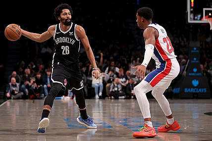 Dec 23, 2023; Brooklyn, New York, USA; Brooklyn Nets guard Spencer Dinwiddie (26) looks to pass the ball against Detroit Pistons guard Jaden Ivey (23) during the second quarter at Barclays Center. Mandatory Credit: Brad Penner-USA TODAY Sports
