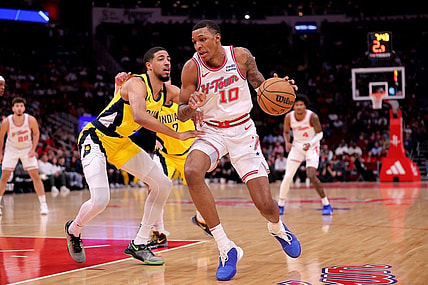 Dec 26, 2023; Houston, Texas, USA; Houston Rockets forward Jabari Smith Jr. (10) handles the ball against Indiana Pacers guard Tyrese Haliburton (0) during the first quarter at Toyota Center. Mandatory Credit: Erik Williams-USA TODAY Sports