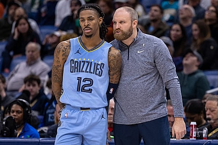 Dec 26, 2023; New Orleans, Louisiana, USA; Memphis Grizzlies head coach Taylor Jenkins talks with guard Ja Morant (12) in the second half against the New Orleans Pelicans at the Smoothie King Center. Mandatory Credit: Stephen Lew-USA TODAY Sports