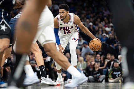 Dec 27, 2023; Orlando, Florida, USA; Philadelphia 76ers forward Tobias Harris (12) dribbles the ball against the Orlando Magic at Kia Center. Mandatory Credit: Jeremy Reper-USA TODAY Sports
