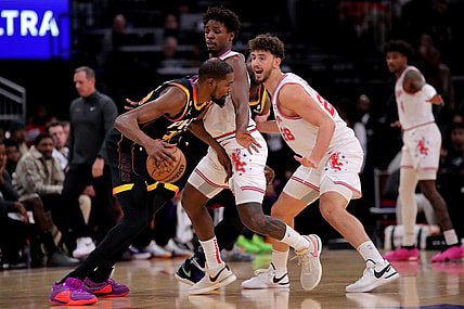 Dec 27, 2023; Houston, Texas, USA; Phoenix Suns forward Kevin Durant (35) handles the ball against Houston Rockets center Alperen Sengun (28) during the second quarter at Toyota Center. Mandatory Credit: Erik Williams-USA TODAY Sports