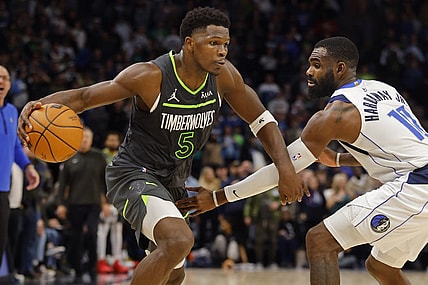 Dec 28, 2023; Minneapolis, Minnesota, USA; Minnesota Timberwolves guard Anthony Edwards (5) works against Dallas Mavericks guard Tim Hardaway Jr. (10) in the fourth quarter at Target Center. Mandatory Credit: Bruce Kluckhohn-USA TODAY Sports