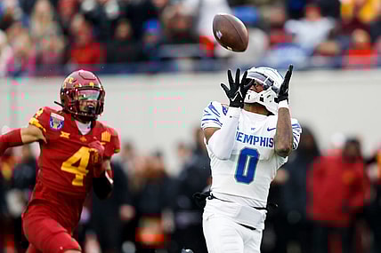Memphis' Demeer Blankumsee (0) catches a pass for a touchdown in the opening drive during the game between the University of Memphis and Iowa State University in the AutoZone Liberty Bowl at Simmons Bank Liberty Stadium on Dec. 29, 2023.