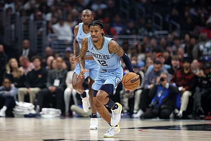 Dec 29, 2023; Los Angeles, California, USA;  Memphis Grizzlies guard Ja Morant (12) dribbles the ball during the first quarter against the Los Angeles Clippers at Crypto.com Arena. Mandatory Credit: Kiyoshi Mio-USA TODAY Sports