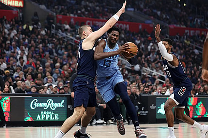 Dec 29, 2023; Los Angeles, California, USA;  Memphis Grizzlies forward Jaren Jackson Jr. (13) drives to the basket against Los Angeles Clippers center Ivica Zubac (40) during the first quarter at Crypto.com Arena. Mandatory Credit: Kiyoshi Mio-USA TODAY Sports