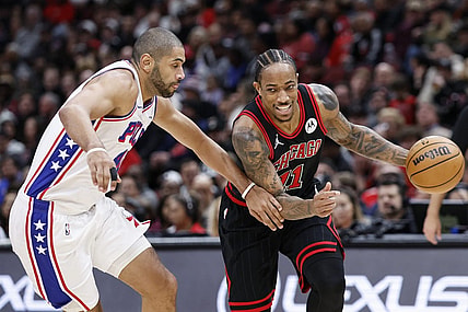 Dec 30, 2023; Chicago, Illinois, USA; Chicago Bulls forward DeMar DeRozan (11) drives to the basket against Philadelphia 76ers forward Nicolas Batum (40) during the first half at United Center. Mandatory Credit: Kamil Krzaczynski-USA TODAY Sports