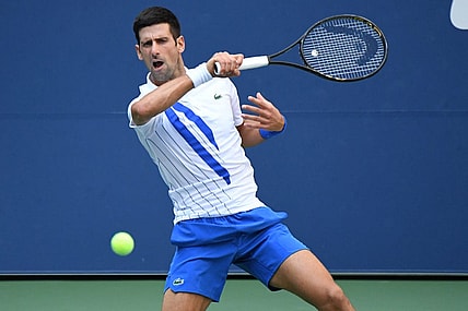 Sep 6, 2020; Flushing Meadows, New York, USA; Novak Djokovic of Serbia hits a forehand against Pablo Carreno Busta of Spain (not pictured) on day seven of the 2020 U.S. Open tennis tournament at USTA Billie Jean King National Tennis Center. Mandatory Credit: Danielle Parhizkaran-USA TODAY Sports