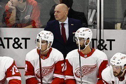 Oct 21, 2022; Chicago, Illinois, USA; Detroit Red Wings head coach Derek Lalonde looks on from the bench during the second period against the Chicago Blackhawks at United Center. Mandatory Credit: Matt Marton-USA TODAY Sports