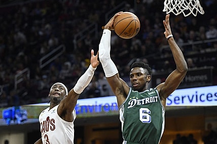 Mar 4, 2023; Cleveland, Ohio, USA; Detroit Pistons guard Hamidou Diallo (6) rebounds beside Cleveland Cavaliers guard Caris LeVert (3)in the fourth quarter at Rocket Mortgage FieldHouse. Mandatory Credit: David Richard-USA TODAY Sports