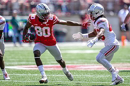 Apr 15, 2023; Columbus, Ohio, United States;  Ohio State Buckeyes wide receiver Noah Rogers (80) evades Ohio State Buckeyes cornerback Diante Griffin (43) during the fourth quarter of the Ohio State Buckeyes spring game at Ohio Stadium on Saturday morning. Mandatory Credit: Joseph Scheller-The Columbus Dispatch

Football Ceb Osufb Spring Game Ohio State At Ohio State