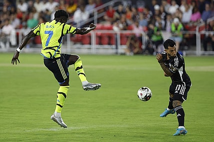 Jul 19, 2023; Washington, DC, USA; MLS All-Stars midfielder Luciano Acosta (11) blocks the shot of Arsenal midfielder Bukayo Saka (7) in the 2023 MLS All Star Game at Audi Field. Mandatory Credit: Geoff Burke-USA TODAY Sports