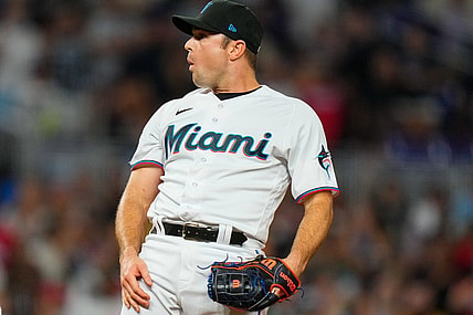 Aug 14, 2023; Miami, Florida, USA; Miami Marlins relief pitcher David Robertson (19) reacts to a call from the umpire against the Houston Astros during the ninth inning at loanDepot Park. Mandatory Credit: Rich Storry-USA TODAY Sports