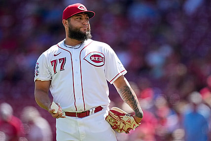 Cincinnati Reds relief pitcher Daniel Duarte (77) tosses a rosin bag and shakes his head after giving up a solo home run to Chicago Cubs right fielder Seiya Suzuki (27) in the eighth inning of an MLB National League game between the Cincinnati Reds and the Chicago Cubs at Great American Ball Park in downtown Cincinnati on Friday, Sept. 1, 2023. The Cubs won the first game of the doubleheader, 6-2.