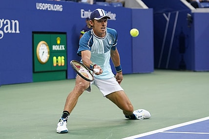 Sep 4, 2023; Flushing, NY, USA; Alex de Minaur of Australia hits to Daniil Medvedev on day eight of the 2023 U.S. Open tennis tournament at USTA Billie Jean King National Tennis Center. Mandatory Credit: Danielle Parhizkaran-USA TODAY Sports