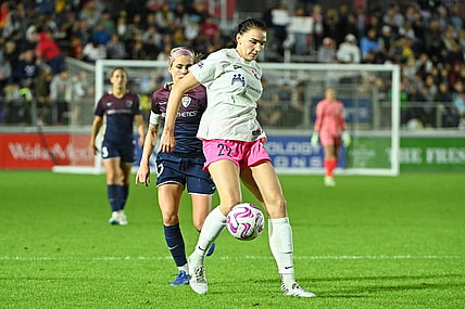 Oct 7, 2023; Cary, North Carolina, USA; San Diego Wave FC midfielder Taylor Kornieck (22) controls the ball against North Carolina Courage midfielder Denise O'Sullivan (10) during the second half at WakeMed Soccer Park. Mandatory Credit: Rob Kinnan-USA TODAY Sports