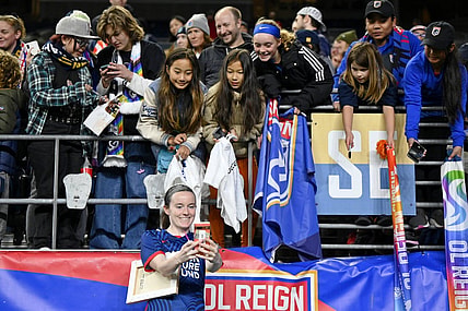 Oct 20, 2023; Seattle, Washington, USA; OL Reign midfielder Rose Lavelle (16) takes a selfie with fans after their win against Angel City FC at Lumen Field. Mandatory Credit: Steven Bisig-USA TODAY Sports