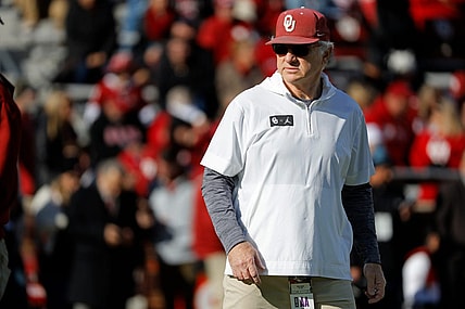 Oklahoma defensive coordinator Ted Roof watches the Sooners warm up before a college football game between the University of Oklahoma Sooners (OU) and the TCU Horned Frogs at Gaylord Family-Oklahoma Memorial Stadium in Norman, Okla., Friday, Nov. 24, 2023. Oklahoma won 69-45.
