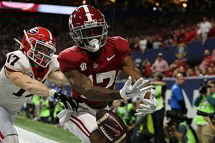 Dec 2, 2023; Atlanta, GA, USA; Alabama Crimson Tide wide receiver Isaiah Bond (17) attempts to make a catch against Georgia Bulldogs defensive back Dan Jackson (17) during the first half of the SEC Championship game at Mercedes-Benz Stadium. Mandatory Credit: Brett Davis-USA TODAY Sports