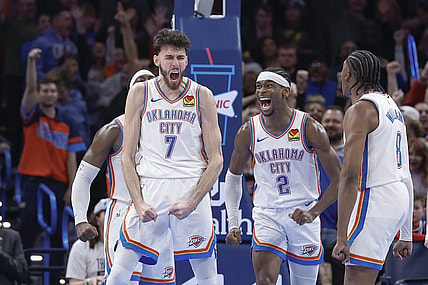 Dec 8, 2023; Oklahoma City, Oklahoma, USA; Oklahoma City Thunder forward Chet Holmgren (7), and guard Shai Gilgeous-Alexander (2) celebrate after Chet Holmgren scores a basket against the Golden State Warriors during the second half at Paycom Center. Mandatory Credit: Alonzo Adams-USA TODAY Sports