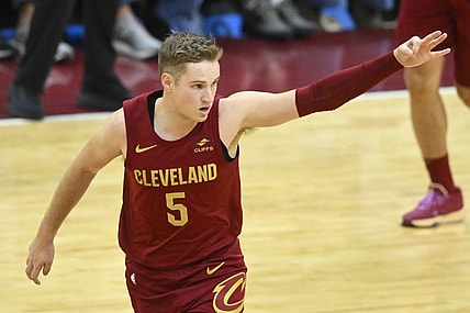 Dec 20, 2023; Cleveland, Ohio, USA; Cleveland Cavaliers guard Sam Merrill (5) celebrates his three-point basket in the fourth quarter against the Utah Jazz at Rocket Mortgage FieldHouse. Mandatory Credit: David Richard-USA TODAY Sports