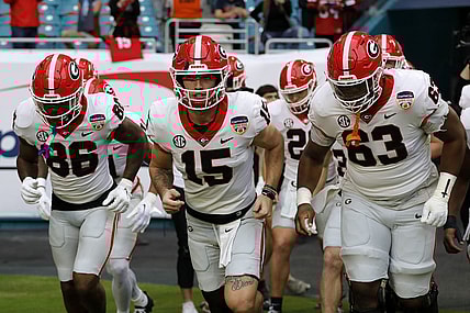 Dec 30, 2023; Miami Gardens, FL, USA; Georgia Bulldogs quarterback Carson Beck (15) leads the team onto the field before the game against the Florida State Seminoles for the 2023 Orange Bowl at Hard Rock Stadium. Mandatory Credit: Sam Navarro-USA TODAY Sports