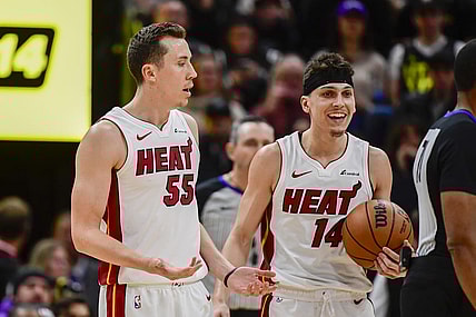 Dec 31, 2022; Salt Lake City, Utah, USA; Miami Heat forward Duncan Robinson (55) and guard Tyler Herro (14) react after a call against the Utah Jazz during the second half at Vivint Arena. Mandatory Credit: Christopher Creveling-USA TODAY Sports