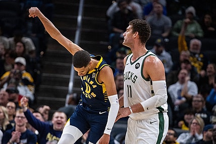 Jan 3, 2024; Indianapolis, Indiana, USA; Indiana Pacers guard Tyrese Haliburton (0) celebrates a made basket in the second quarter against the Milwaukee Bucks at Gainbridge Fieldhouse. Mandatory Credit: Trevor Ruszkowski-USA TODAY Sports