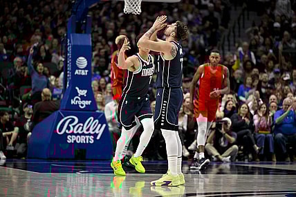 Jan 3, 2024; Dallas, Texas, USA; Dallas Mavericks guard Luka Doncic (77) celebrates after making a three point basket against the Portland Trail Blazers during the second quarter at the American Airlines Center. Mandatory Credit: Jerome Miron-USA TODAY Sports