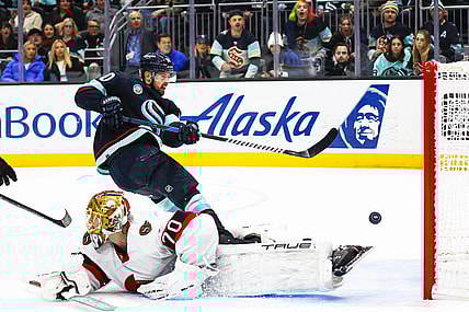 Jan 4, 2024; Seattle, Washington, USA; Seattle Kraken left wing Tomas Tatar (90) scores a goal against Ottawa Senators goaltender Joonas Korpisalo (70) during the second period at Climate Pledge Arena. Mandatory Credit: Joe Nicholson-USA TODAY Sports