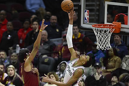 Jan 7, 2024; Cleveland, Ohio, USA; San Antonio Spurs center Victor Wembanyama (1) blocks a shot by Cleveland Cavaliers center Jarrett Allen (31) in the fourth quarter at Rocket Mortgage FieldHouse. Mandatory Credit: David Richard-USA TODAY Sports