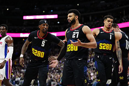 Jan 7, 2024; Denver, Colorado, USA; Denver Nuggets guard Jamal Murray (27) and guard Kentavious Caldwell-Pope (5) and forward Michael Porter Jr. (1) in the first quarter against the Detroit Pistons at Ball Arena. Mandatory Credit: Ron Chenoy-USA TODAY Sports