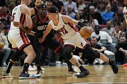 Jan 8, 2024; Miami, Florida, USA;  Miami Heat guard Tyler Herro (14) drives toward the basket against the Houston Rockets during the first half at Kaseya Center. Mandatory Credit: Jim Rassol-USA TODAY Sports
