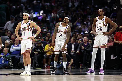 Jan 8, 2024; Los Angeles, California, USA;  Phoenix Suns guard Devin Booker (1) and guard Bradley Beal (3) and forward Kevin Durant (35) stands on the floor during the fourth quarter against the Los Angeles Clippers at Crypto.com Arena. Mandatory Credit: Kiyoshi Mio-USA TODAY Sports