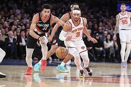 Jan 9, 2024; New York, New York, USA; Portland Trail Blazers forward Toumani Camara (33) and New York Knicks guard Josh Hart (3) chase a loose ball in the second quarter at Madison Square Garden. Mandatory Credit: Wendell Cruz-USA TODAY Sports