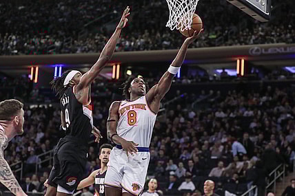 Jan 9, 2024; New York, New York, USA; New York Knicks forward OG Anunoby (8) drives past Portland Trail Blazers forward Jerami Grant (9) for a layup in the third quarter at Madison Square Garden. Mandatory Credit: Wendell Cruz-USA TODAY Sports