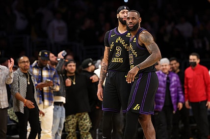 Jan 9, 2024; Los Angeles, California, USA;  Los Angeles Lakers forward LeBron James (23) celebrates a victory with forward Anthony Davis (3) after defeating the Toronto Raptors at Crypto.com Arena. Mandatory Credit: Kiyoshi Mio-USA TODAY Sports